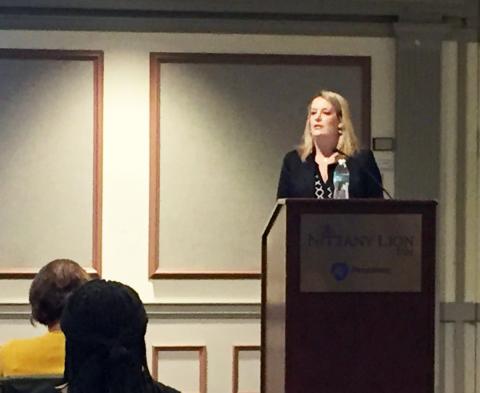 Photo of Shannon Monnat speaking at the conference.