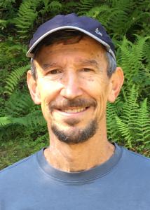 Lee with blue ball cap and t-shirt